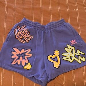 Adidas Purple Shorts with Neon Graphics